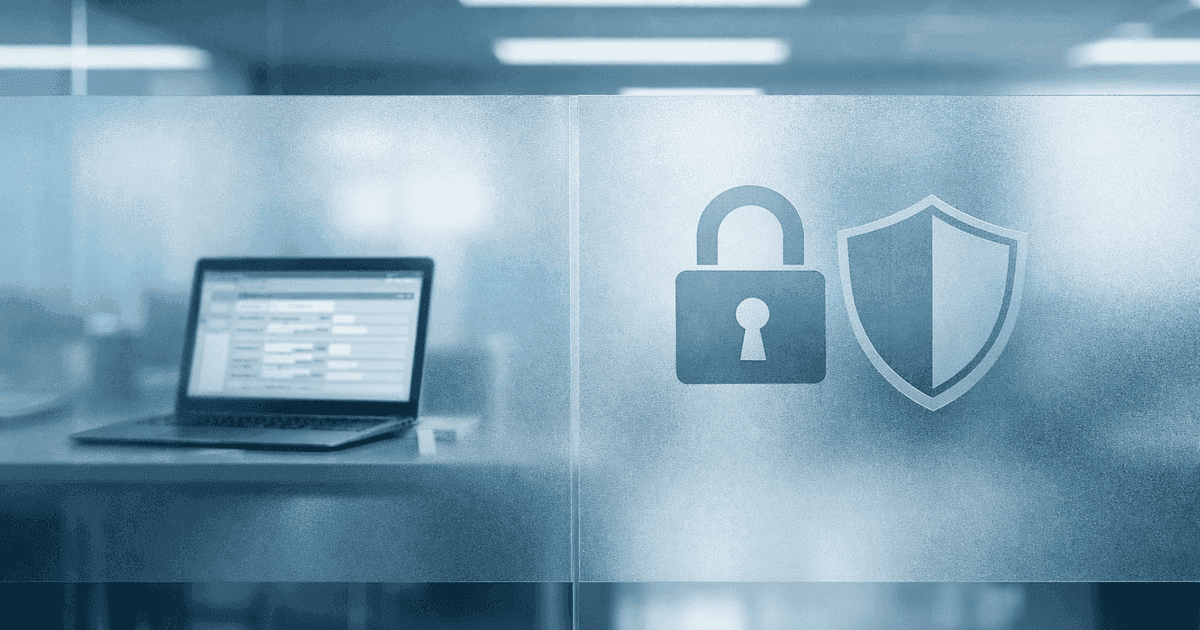 Frosted privacy glass dividing a workspace with data screen and security symbols
